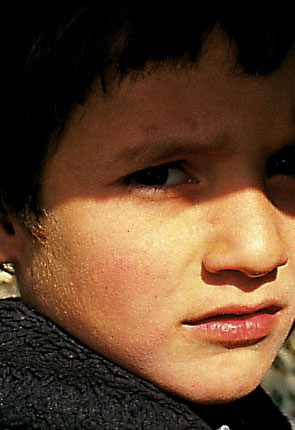 Photo of young boy in shadow by Rafiq Kathwari